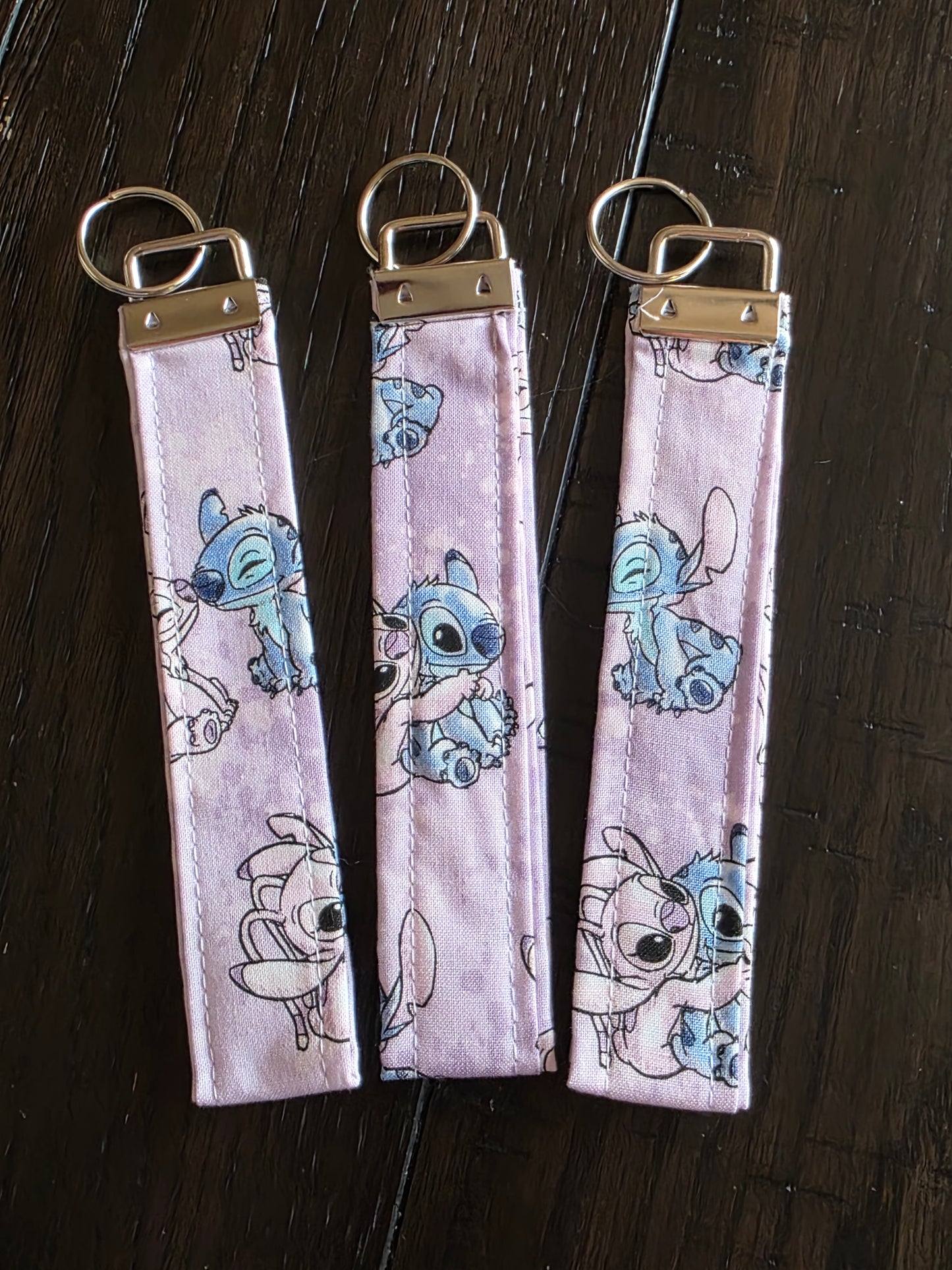 Stitch purple wristlet