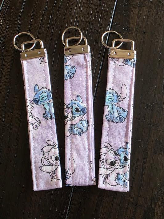 Stitch purple wristlet